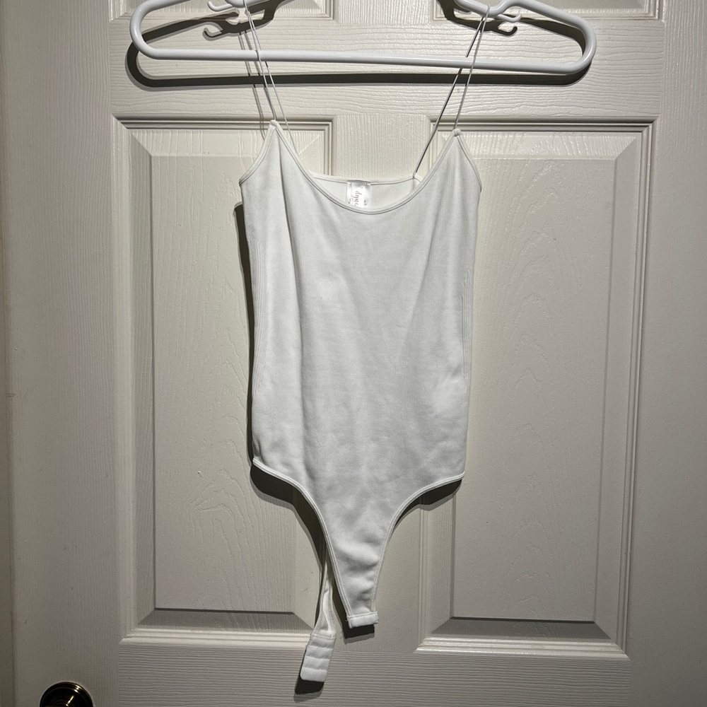 Super cute white tank bodysuit